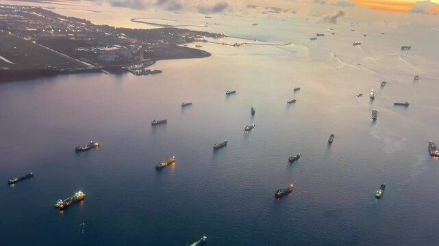 Timelapse of Ships Anchored in the Strait of Malacca at Sunset