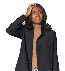 Young Indian woman in business suit being shocked, she has remembered important meeting.