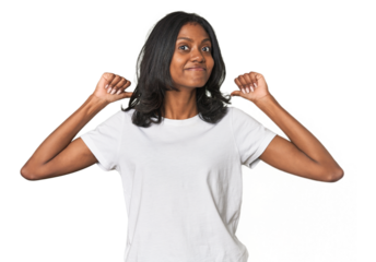 Portrait of a young Indian woman feels proud and self confident, example to follow.