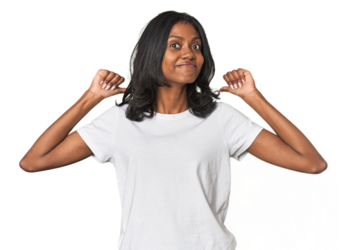 Portrait of a young Indian woman feels proud and self confident, example to follow.