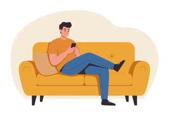 Man relaxes on sofa engrossed with phone