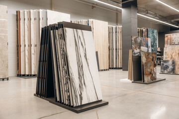 Fototapeta na wymiar Modern Store Displaying Diverse Marble Slabs and Building Materials for Design Needs