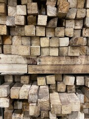 Stacked Rough Sawn Wooden Planks in Lumberyard