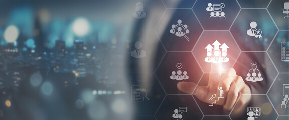 Human Resource Development Planning Concept. Human resource development and strategic workforce planning, interacting with virtual interface icons symbolizing growth, talent management and success.