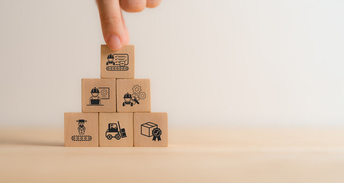 Production Management Concept. Wooden block with an icon representing production planning and control, symbolizing effective production management, operational strategy, and process optimization.