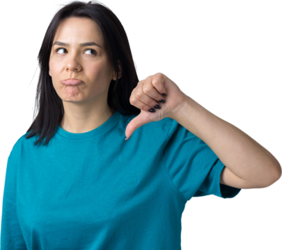 Young brunette in a blue tank top giving thumb down gesture looking with negative expression