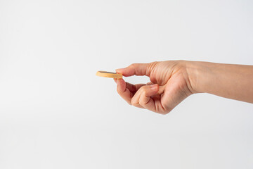 Sweet Bakery Cookies with chocolate and hand on white background
