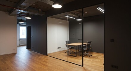 Conference room with glass walls in a modern office space and wooden floor