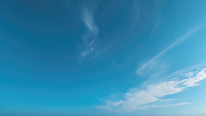Obraz premium With blue skies and white clouds overhead, the warm sunshine and cool breeze on a clear day create a revitalizing environment.