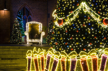 CHRISTMAS TREE AND ARMCHAIR FOR SANTA CLAUS -  Decorations in the town hall square