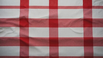 Textiles and fabric on a red checkered tablecloth background.