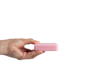 Pink soap in hand on transparent background