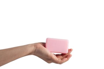 Pink soap in hand on transparent background