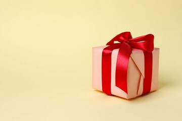 Beautiful gift box on color background