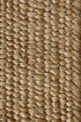 macro texture of summer brown paper hat as background, close up texture of panama hat, paper for panama hat	
