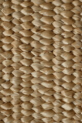 macro texture of summer brown paper hat as background, close up texture of panama hat, paper for panama hat	

