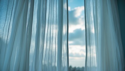 Curtain covering window with view of the sky