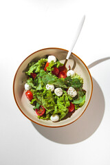 Fresh salad with dressing for you