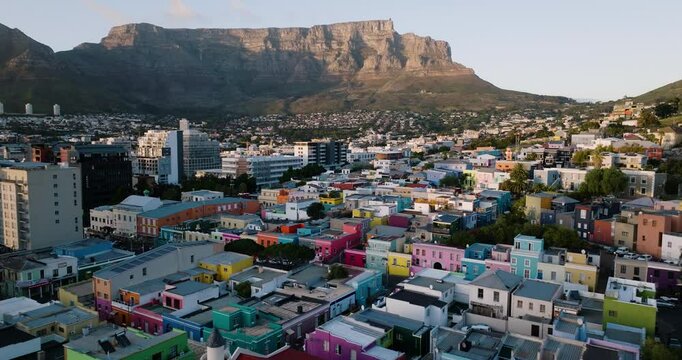 Aerial close-up view of the popular historic tourist destination of the vibrant, colourfull houses in Bo-Kaap (Cape Malay Quarter) in Cape Town.  Lions Head mountain in the background. 