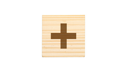 Obraz premium A wooden block featuring a brown plus sign, perfectly illustrating addition or positivity.