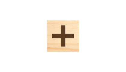 Obraz premium wooden block with a carved plus sign