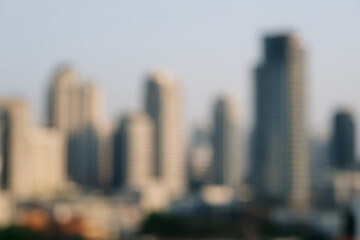 Skyline Silhouette: Abstract cityscape with buildings in a blurred view, offering a tranquil, modern, and minimalist feel.