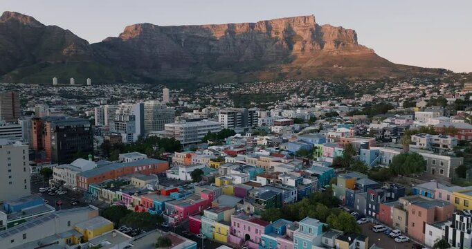 Spectacular aerial view of the popular historic tourist destination of the vibrant, colourfull houses in Bo-Kaap (Cape Malay Quarter) in Cape Town.  Lions Head mountain in the background. 