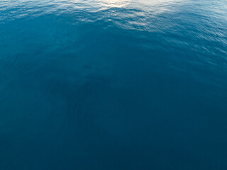 Obraz premium Aerial view beautiful sea surface nature background,Amazing waves texture ocean sea background