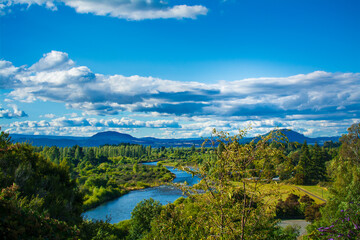 Obraz premium Estuary of Tongariro river near Lake Taupo. Magnificent mountains in the background. North Island Volcanic Plateau, New Zealand