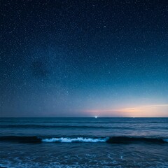 Night sky over the sea dotted with stars. Calm seascape, nocturnal nature