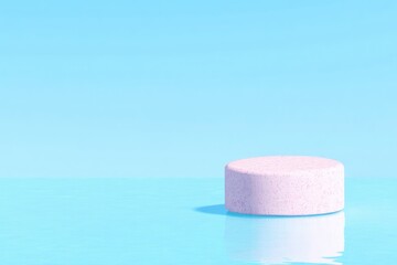 Pastel pink cylinder on a light blue surface
