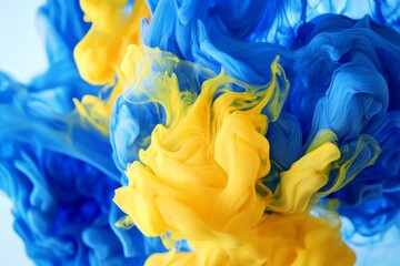 Vibrant mix of swirling blue and yellow liquids.
