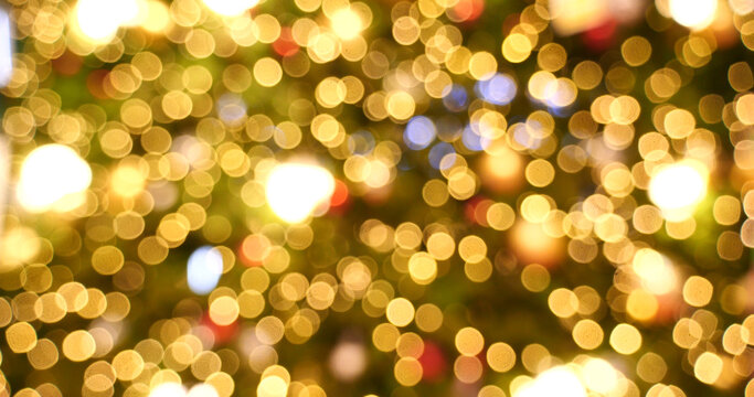 Blurred background golden glitter shiny sparkling banner. Happy Holidays background for template on christmas card brochures posters. Gold bokeh template for digital presentation slideshow background