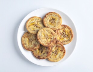 Delicious Golden Fried Banana Slices on a Plate Sweet Treat Healthy Snack Food Photography