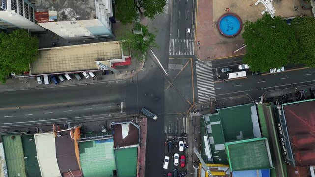 Top View of Busy Intersection Near Marikina Cityhood Park In Marikina City, Philippines. aerial shot