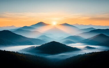 Majestic sunrise over misty mountain ranges
