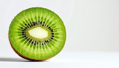 Slicing fresh kiwi fruit kitchen counter food photography bright lighting close-up healthy eating concept