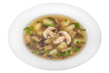 Soup with mushrooms and potatoes. Isolated on a white background.