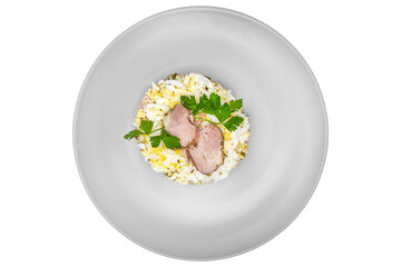 Risotto with pork, egg and vegetables. Isolated over white background
