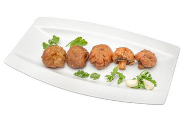 grilled championsedit with parsley and garlic on a white plate. Isolated