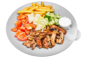 Plate with kebab, french fries and salad. Isolated over white background
