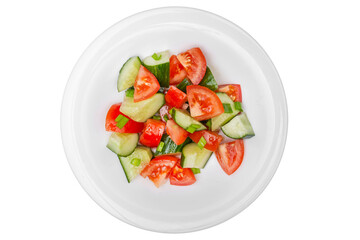 Salad with cucumbers and tomatoes. Isolated over white background