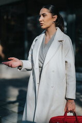 A professional woman, dressed in a white coat, participates in a conversation during a sunny day...