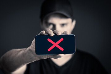 Censorship online. Phone with ban or restriction. Cancel culture. Silence opinions. Censored, taboo or secrecy. Quiet and silent man on internet. Digital block. Forbidden secret. Freedom of speech.