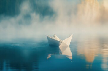 a delicate white paper boat floating on calm blue water