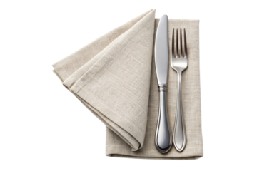 Elegant silver cutlery set placed on a folded linen napkin isolated with transparent background