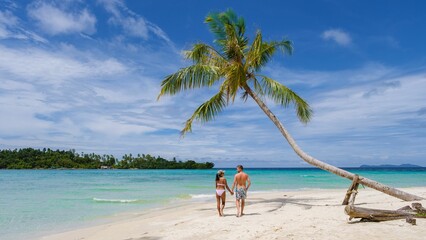Stunning tropical beach getaway on Koh Kood Island with palm trees and blue ocean