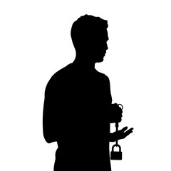 Silhouette of a person holding a padlock in contemplation  