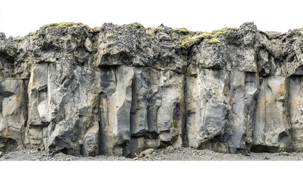 Weathered basalt cliffs with porous textures on white background