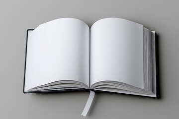 Blank notebook lies open on a gray surface ready for thoughts